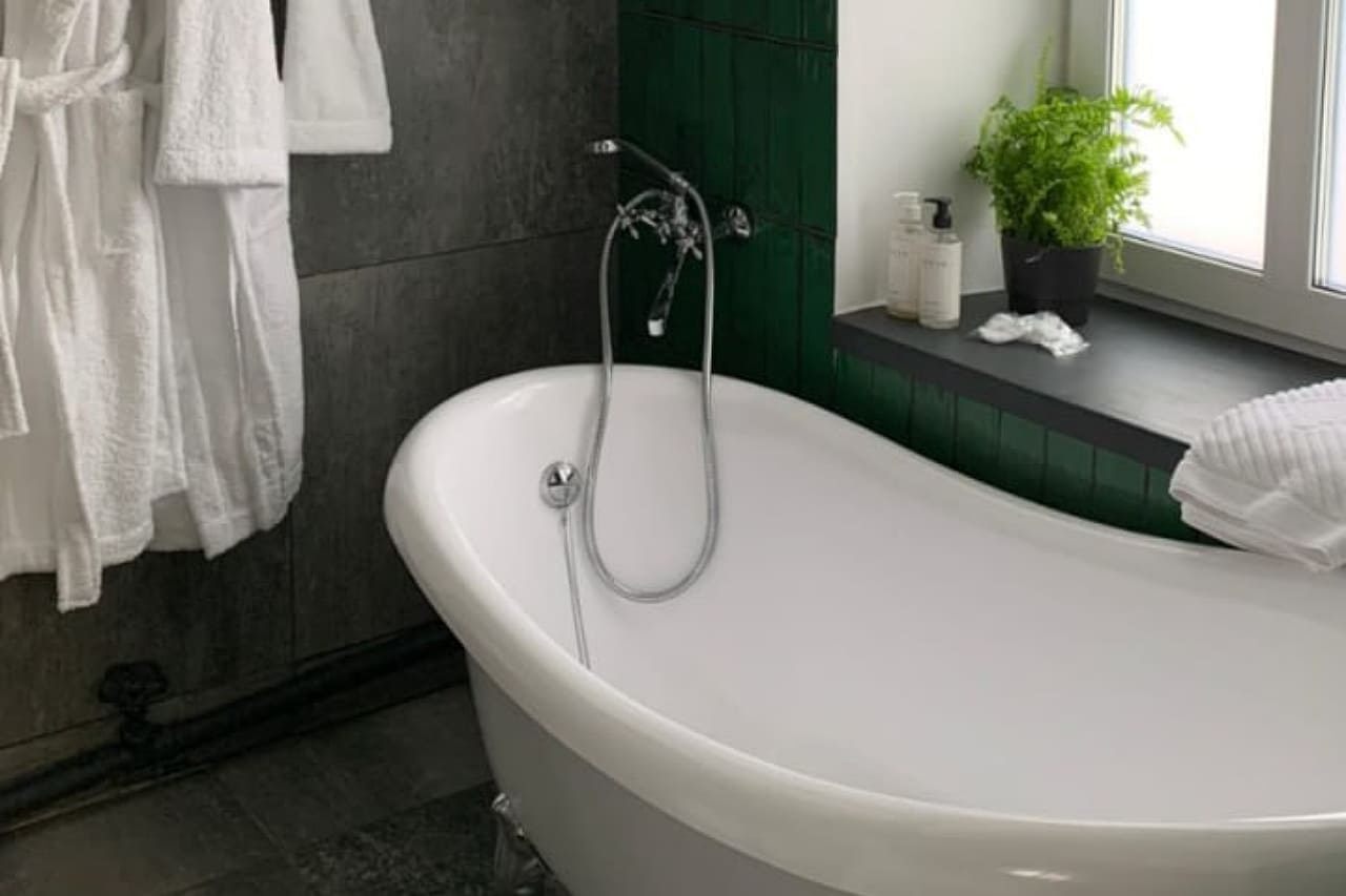 Апартаменты Студио №5 отель У Груши - спальная зона и зона отдыха